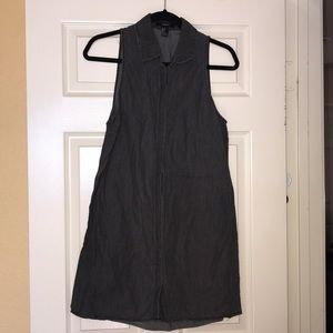 Grey denim button down collared dress.